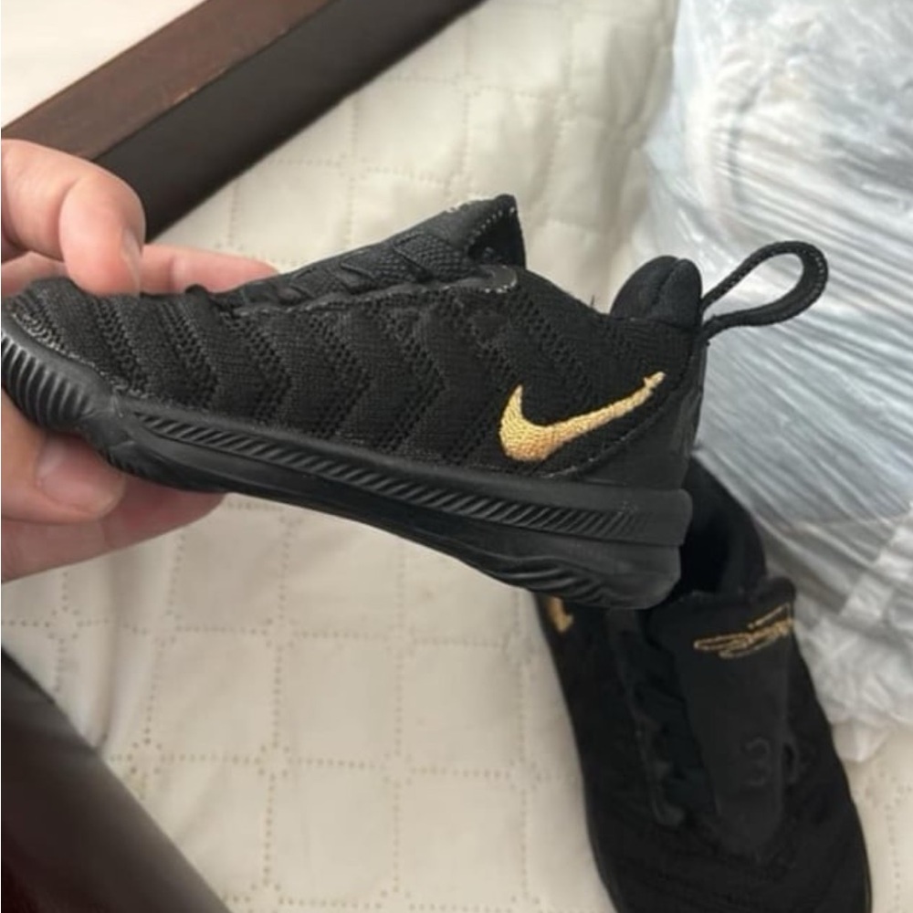 Nike Black and Gold Textured Sneakers